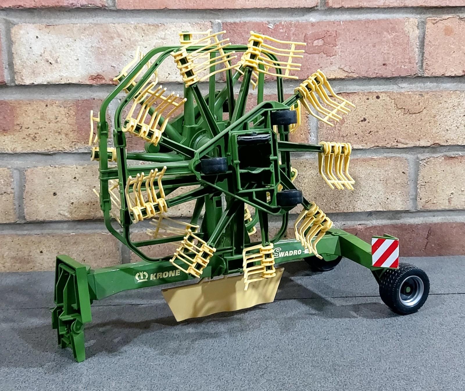 Bruder Krone Dual Rotary Swath Windrower 1:16