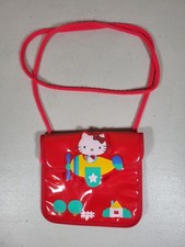 Bolso Hello Kitty rojo pequeño vintage vinilo avión volador Hello Kitty