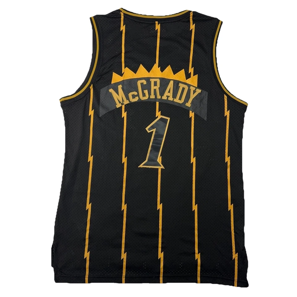 Camiseta Mitchell & Ness 1998-99 Tracy McGrady Toronto Raptors Negra Dorada L 44 HWC Foto 2 de 4