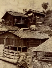 Switzerland, children in front of the chalets, vintage print, ca.1880 Switzerland, children deva
