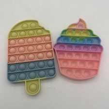 push pop bubble sensory fidget toys in popsicle and cupcake shapes