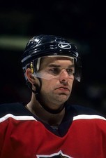 Dan Boyle Florida Panthers skates on the ice at an NHL game - Ice Hockey Photo 4