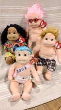 4 TY BEANIE KIDS -- BABY 2002, CALYPSO, CHIPPER & LUVIE