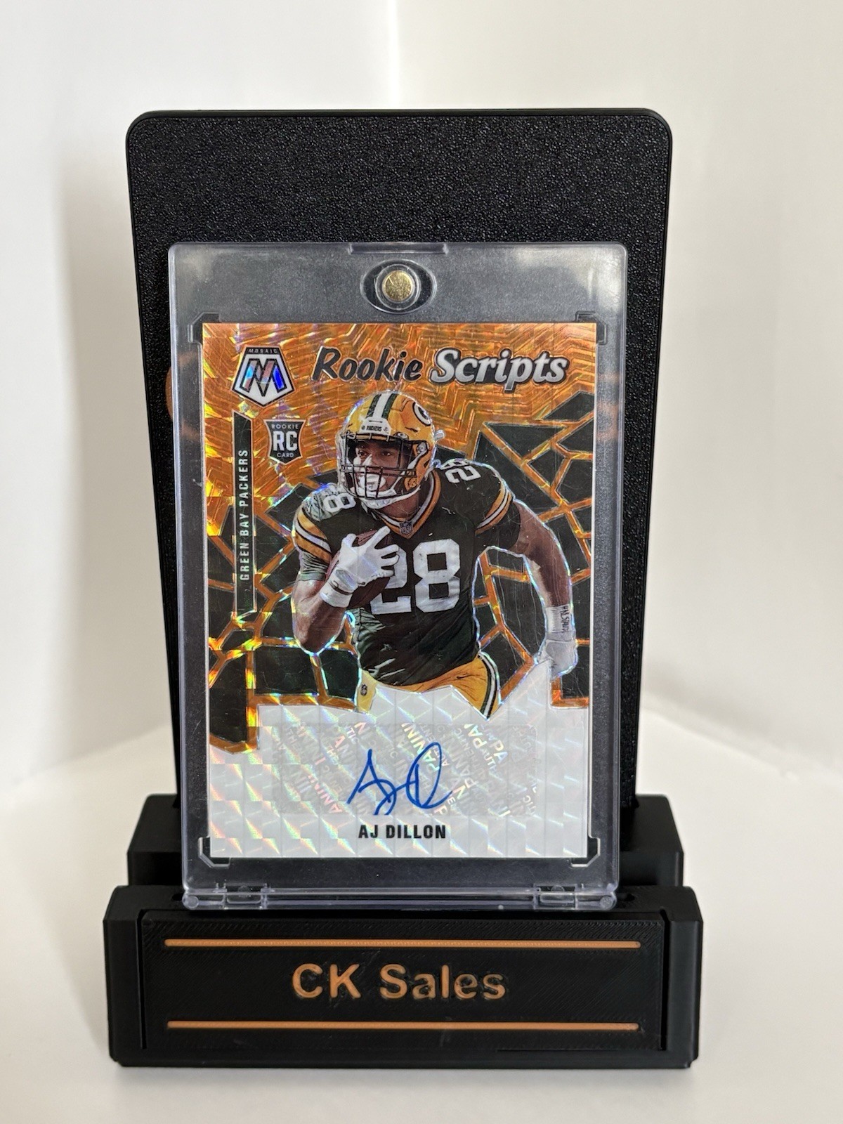 2020 Panini Mosaic - Rookie Scripts AJ Dillon #RS26 Orange Prizm (AU, RC)