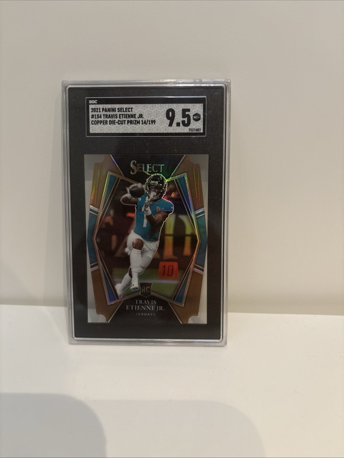 2021 Panini Select Travis Etienne #154 Copper Die-Cut Prizm /199 9.5