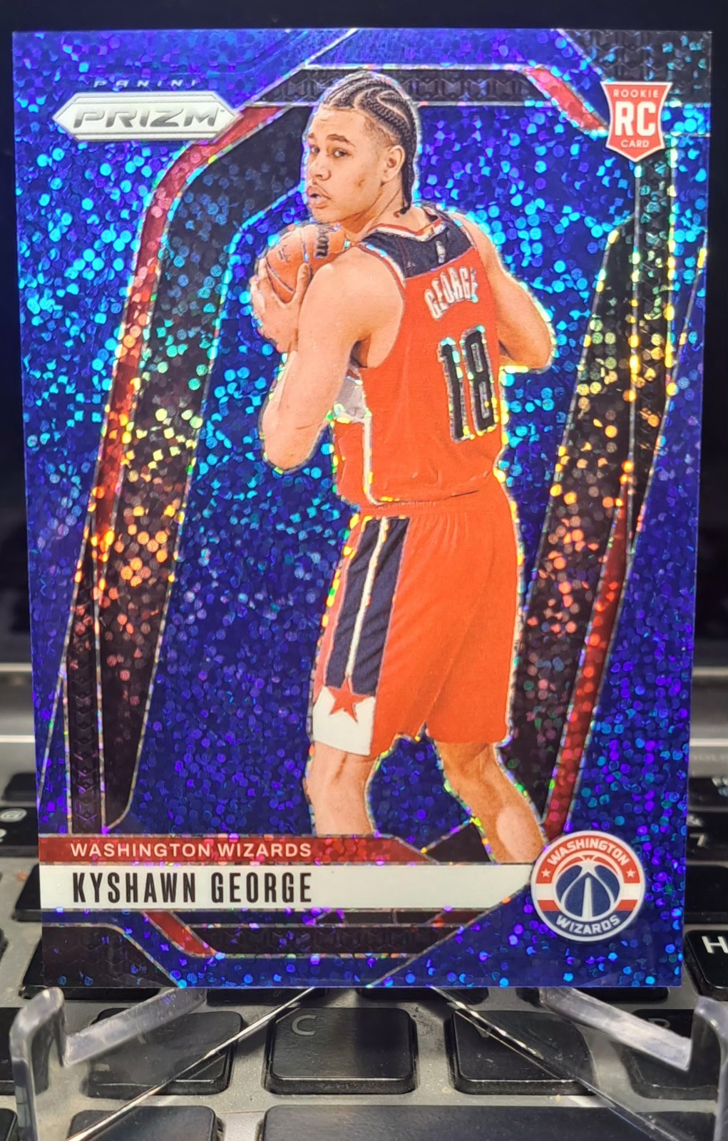 2024-25 Panini Prizm - Kyshawn George #257 Blue Sparkle Prizm /144 (RC)