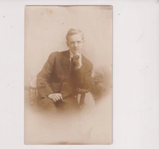 Postcard RPPC Real Photo Young Man Posing In Chair KRUXO c 1907-1920s See Photos