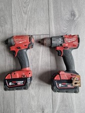Milwaukee M18 Fuel M18FPD2 Drill & M18CID Impact Driver 2 5.0ah Batteries