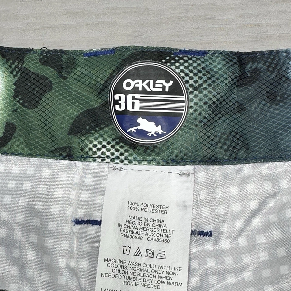 Pantalones Cortos Oakley Frog Para Hombres 36 Híbridos Tabla Playa Azul Blanco Cuadros Ligeros Foto 2 de 4