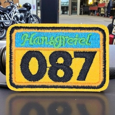 HANSGRETEL NUMBER 087 YELLOW LICENSE PLATE IRON ON PATCH 1.5 X 2.0''