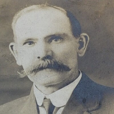 REAL PICTURE POSTCARD (RPPC) 1800s mustashed dapper man award pin unposted