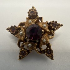 Vintage Unsigned Gold Tone Star Brooch with Purple Rhinestones Seed Pearls