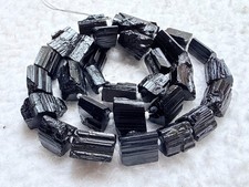 Black tourmaline rough beads. 19/10 mm 16 inches strand Sku-1137