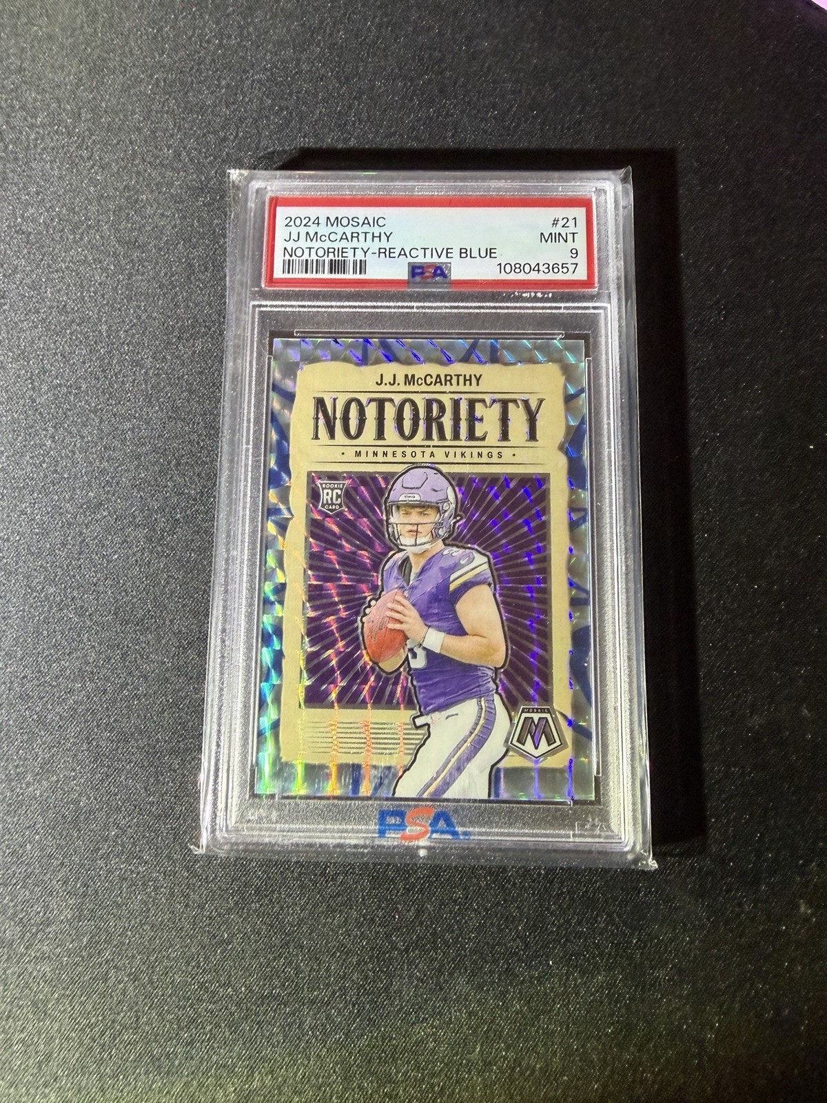 2024 Panini Mosaic #21 J.J. McCarthy Notoriety Reactive Blue 14/99 Vikings PSA 9