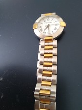 montre vintage - homme-saint laurent -jamais portée- dateur -bracelet acier