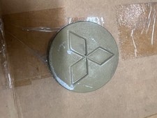 Mitsubishi center cap, #, (P9209)  outside app 2 .25 inches MB816391