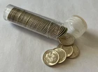 Roll of 50 silver dimes. $5 face value. Appear uncirculated.