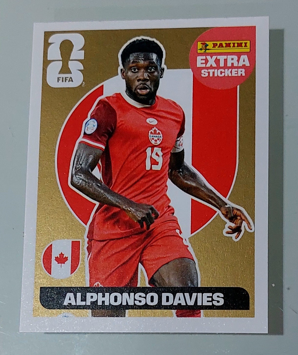 Panini World Cup 2026 - ALPHONSO DAVIES - extrasticker GOLD Extra Sticker