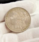 1884 US Morgan Silver Dollar $1 Unc Nice  Toning
