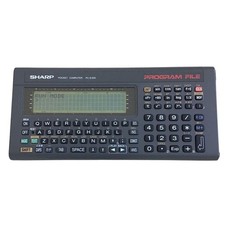 SHARP PC-E200 Pocket Computer Z80 CPU 32KB RAM Tested Working Vintage Japan