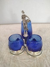 Silver-plated salt cellar set with cobalt blue glass inserts and F I G U R A L