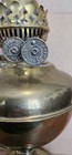 Vintage brass kerosene oil lamp  featuring a compressed font and weighted base — photo 4