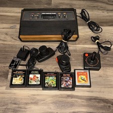 Atari 2600 Console W/ 5 Games And Controllers