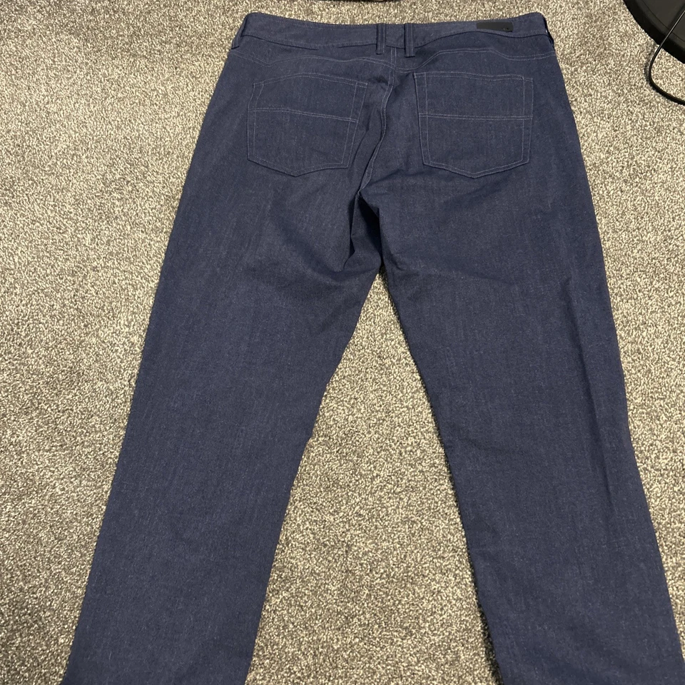 Pantalones deportivos para exteriores Rhone Commuter azules de poliéster para hombre talla 35 35 X 28 Foto 4 de 4