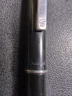Black Eversharp mechanical pencil with silver tone trim, engraved with “Eversharp” in silver on textured surface.
