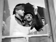 Window shattered by anti aircraft fire during a bombing alert Par- 1939 Photo