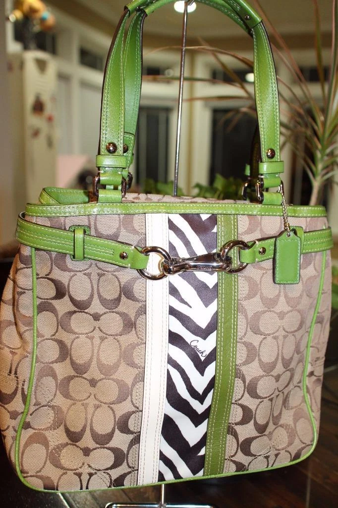 Zebra coach purse sale