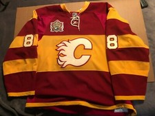 2011 NHL HERITAGE CLASSIC CALGARY FLAMES GAME USED UNIFORM: JERSEY, GLOVES, PANT
