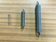 VARIOUS SIZES OF STEEL COMPRESSION AND EXTENSION SPRINGS 