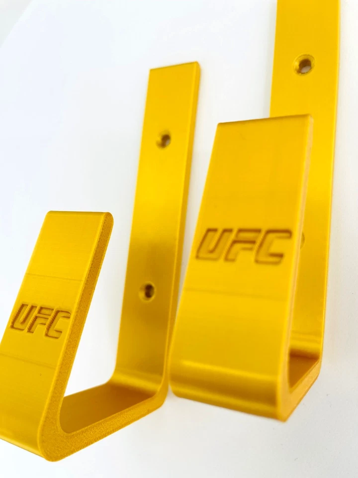 Soportes de montaje en pared para cinturón de campeonato UFC dorado - Ganchos de exhibición de pared (juego de 2) Foto 3 de 4