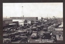 REAL PHOTO BORGER TEXAS DOWNTOWN STREET SCENE OLD CARS POSTCARD COPY