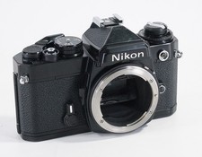 BLACK NIKON FE BODY, FILM DOOR SEALING MARGINAL IN ONE AREA/sse/223412