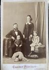 Gorgeous Antique Cabinet Studio Portrait Of Family With Their Whippet Germany