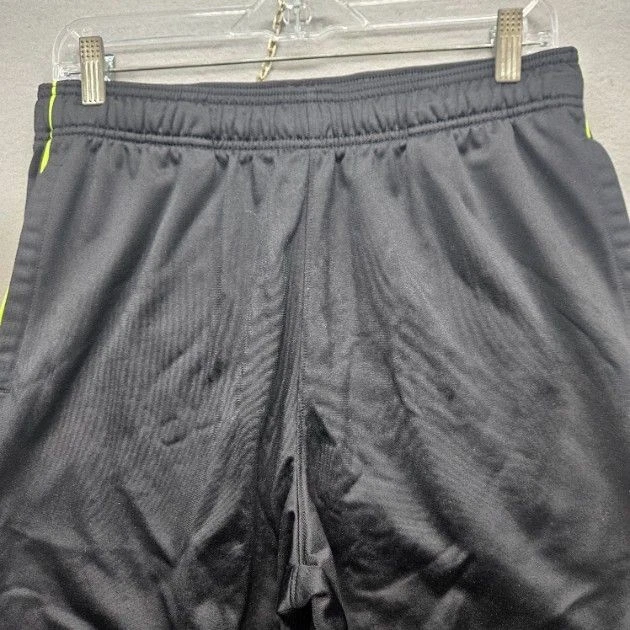 Pantalones deportivos Fila para hombre talla mediana negros amarillos neón pista deportiva Foto 3 de 4