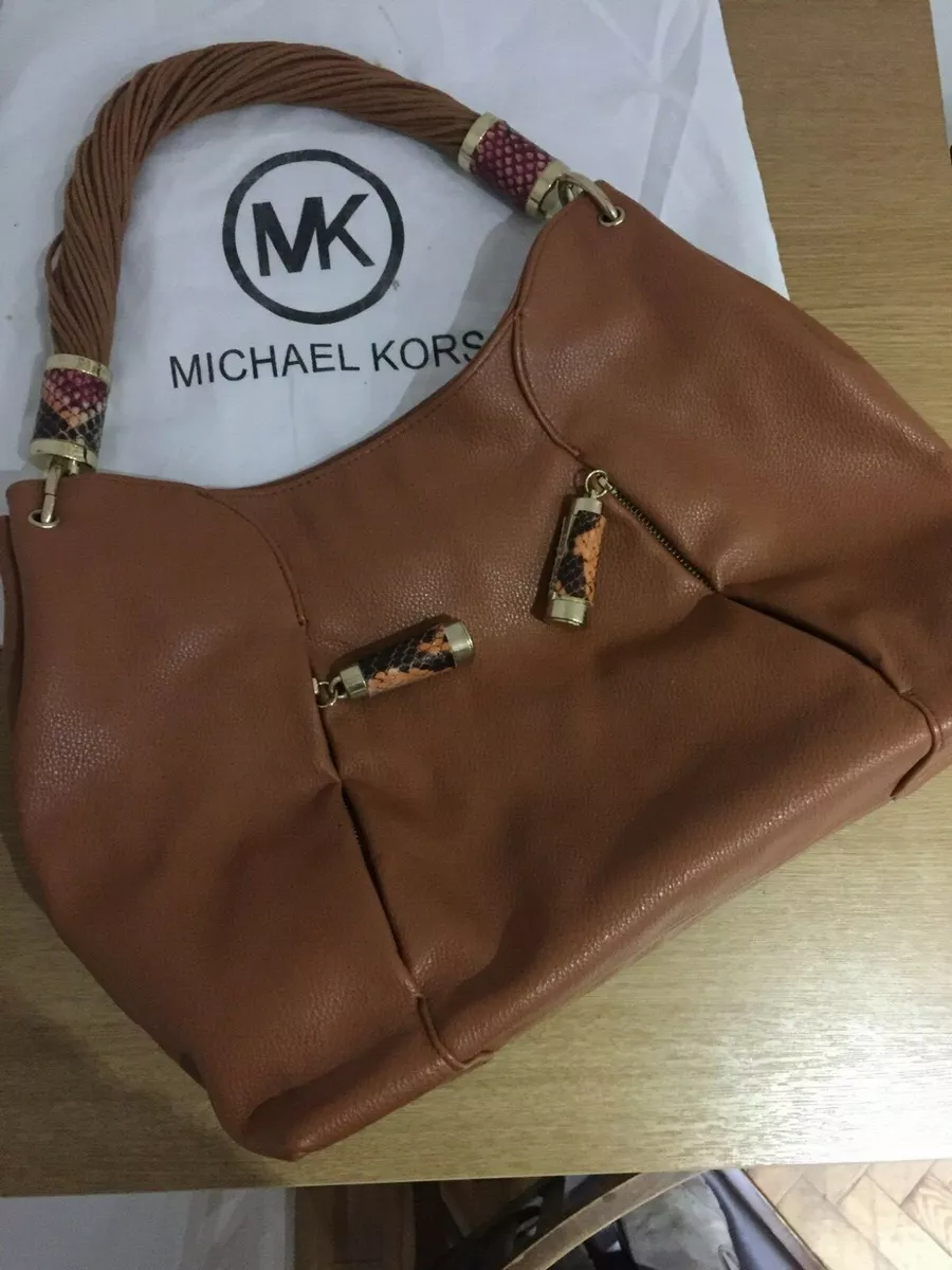 Price of michael 2024 kors sling bag