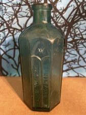 RUMFORD CHEMICAL WORKS 8-SIDED TEAL DOUBLE ERROR 1890 HAND BLOWN MEDICINE BOTTLE