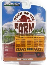 1/64 GREENLIGHT TOY BALE THROW WAGON YELLOW/RED  48070