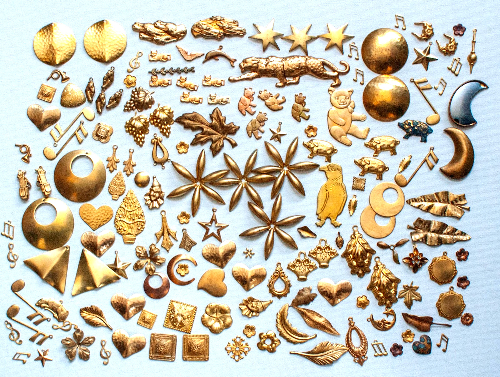 Lot 164  1/2 lb (151 pcs) VINTAGE BRASS STAMPINGS, Prowling Leopard