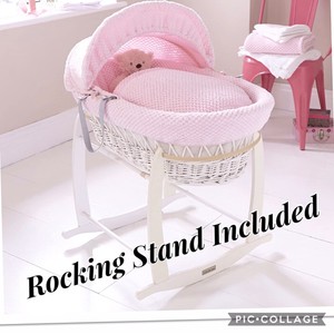 pink moses basket with stand