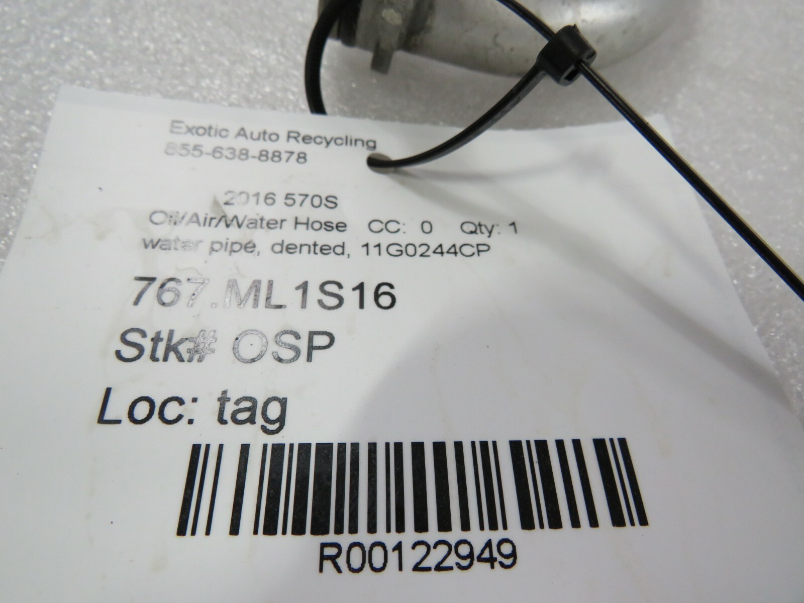 McLaren 570S, Engine Oil Line, Used, Dented, P/N 11G0244CP