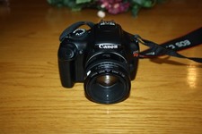 Canon EOS Rebel T3 1100D DSLR 12,2 megapixel fotocamera digitale con obiettivo 50 mm.  Colore Nero