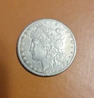 1899 O Morgan Silver Dollar
