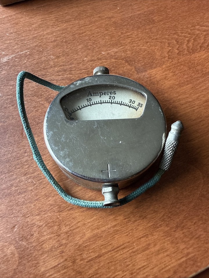 A 1920s–30s ammeter with its original instruction sheet still intact — this is basically a working piece of steampunk-adjacent electrical history that looks incredible on a desk.
