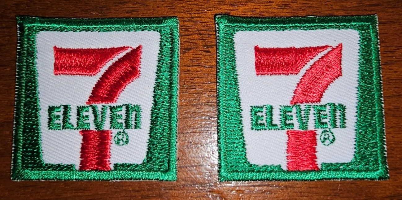LOT OF 2 new old stock 7 ELEVEN  EMBROIDERED IRON ON PATCHES  1.75" X 1.75"