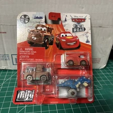 Disney Pixar Cars Mini Racers On The Road Cave McQueen, Cave Mater, Tyrana.Rex