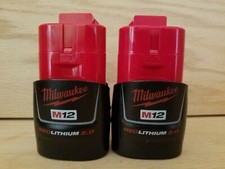 2 -Brand New Genuine Milwaukee M12 2.0 amp hr Red Lithium Batt's 48-11-2420